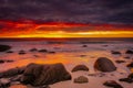 Dramatic midnight sunset with amazing colors over Uttakleiv beach on Lofoten Islands,  Norway Royalty Free Stock Photo