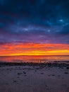 Dramatic midnight sunset with amazing colors over Uttakleiv beach on Lofoten Islands,  Norway Royalty Free Stock Photo