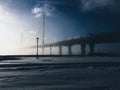 Dramatic moody winter view of large cable-stayed bridge in Saint Petersburg