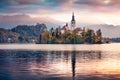 Dramatic morning view of Pilgrimage Church of the Assumption of Maria. Captivating autumn scene of Bled lake, Julian Alps, Sloveni Royalty Free Stock Photo