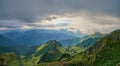 Dramatic mountain landscape on a foggy morning. Royalty Free Stock Photo