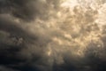 Dramatic mystical sky with dense clouds and back sunlight. artistic picture for the original background, layout or decoration