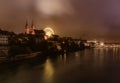 Dramatic night cityscape of the Basel old town skyline