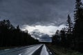 Dramatic northern scandinavian route. Cold northern europe freeway. Nature forest