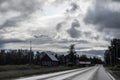 Dramatic northern scandinavian route. Cold northern europe freeway. Nature forest