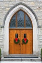 Dramatic oak wooden church doors Royalty Free Stock Photo