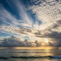 Dramatic ocean sunset with extensive cloud formations. The sky di Royalty Free Stock Photo