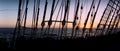 Sunset in the Atlantic Ocean - view through the shrouds from the deck of the tall ship Royalty Free Stock Photo