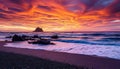 Dramatic Ocean Sunset Vibrant Sky Waves Rocks Beach Royalty Free Stock Photo