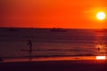 Dramatic orange sea sunset with boats. Summer time. Travel to Philippines. Luxury tropical vacation. Boracay paradise island. Royalty Free Stock Photo