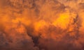 Dramatic orange sky and clouds abstract background. Top view of orange clouds. Warm weather background. Art picture of orange Royalty Free Stock Photo