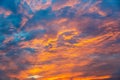 Dramatic orange sky with clouds at sunset