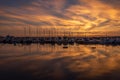 Dramatic orange sunset in the port. Ischia, Italy Royalty Free Stock Photo