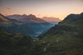 Dramatic panoramic view of Swiss Alps with road and valley at Klausen Pass Royalty Free Stock Photo