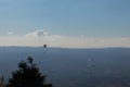 Dramatic paragliding duo with beautiful scenery Royalty Free Stock Photo