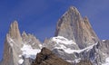 Dramatic Peaks Piercing a Blue Sky