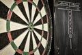 Dramatic photo of a dart board