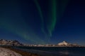 Dramatic polar lights, Aurora borealis over the mountains in the North of Europe - Lofoten islands, Norway Royalty Free Stock Photo