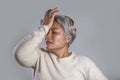 Dramatic portrait of attractive sad and depressed middle aged Asian woman crying helpless suffering depression problem and anxiety Royalty Free Stock Photo