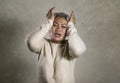 Dramatic portrait of attractive sad and depressed middle aged Asian woman crying helpless suffering depression problem and anxiety Royalty Free Stock Photo