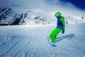 Dramatic portrait of snowboard boy ride downhill Royalty Free Stock Photo