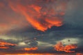 Dramatic radiant fiery orange clouds at sunset Royalty Free Stock Photo