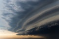 Dramatic rainy sky and dark clouds. Hurricane wind. Strong hurricane over the city. The sky is covered with black storm clouds. Sc