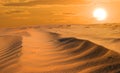 Dramatic red sunset over the wide sandy desert