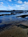 Dramatic rock pools and reef at Petticoat Creek Beach Royalty Free Stock Photo