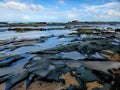 Dramatic rock pools at Petticoat Creek Beach