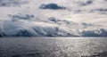 Dramatic rolling clouds, island off Antarctica