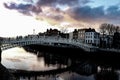 Dramatic scene Dublin night scene with Ha`penny bridge and Liffey river lights Royalty Free Stock Photo