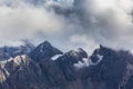 Dramatic scenery in the Dolomite Alps, Italy, in summer, with storm clouds and majestic peaks Royalty Free Stock Photo