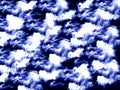 Dramatic Seamless Pattern of Fluffy White Clouds Against an Indigo Sky Royalty Free Stock Photo