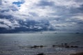 Dramatic seascape in dark colors. Dark sky with clouds over the stormy sea. Royalty Free Stock Photo