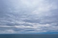 Dramatic seascape with grey cloudy sky over it Royalty Free Stock Photo