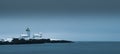 Dramatic seascape with moody Langoytangen Lighthouse, Langesund, South Coast line of Norway