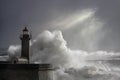 Dramatic seascape with stormy waves over lighthouse Royalty Free Stock Photo