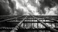 A dramatic shot of the rebar framework with a stormy sky in the background signifying the strength and durability of the