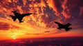 Dramatic silhouette of two fighter jets soaring through vibrant sunset clouds with fiery backdrop Royalty Free Stock Photo