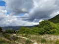 Dramatic sky behind a mountain landscape, big grey clouds Royalty Free Stock Photo