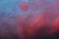 Dramatic sky with bright red and dark blue stormy clouds. Nature background Royalty Free Stock Photo