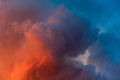 Dramatic sky with bright red and dark blue stormy clouds. Nature background Royalty Free Stock Photo