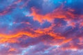 Dramatic sky with bright red and dark blue stormy clouds. Nature background Royalty Free Stock Photo