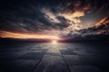 Dramatic Sky Clouds, a Dark Concrete Floor Background, and a Sunset Horizon Royalty Free Stock Photo