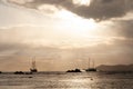 Silhouette of sailboat with Dramatic sky in a tropical sunset. Royalty Free Stock Photo