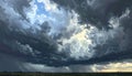 Dramatic Sky with Dark Clouds and Sunlight Breaking Through Royalty Free Stock Photo