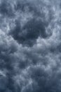 A dramatic sky, full of grey Cumulus clouds. Background.