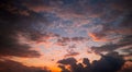 Dramatic Sky. Majestic sunlight. Night light reflected on clouds. Night Sun rays over panoramic view. Freedom peaceful Royalty Free Stock Photo