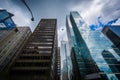 Dramatic sky and modern buildings in the Financial District, in Royalty Free Stock Photo